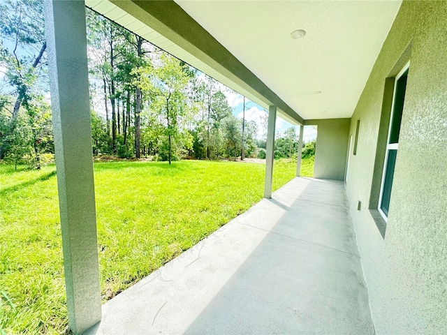 8051 N Pinkinz Way, Citrus Springs, FL 34433 - view of grassy yard with a patio area