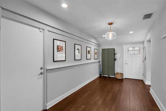 1322 N Bumby Ave, Orlando, FL 32803 - entryway with wood finished floors, recessed lighting, and vaulted ceiling