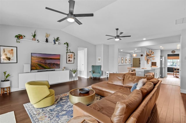 1322 N Bumby Ave, Orlando, FL 32803 - living room featuring ceiling fan, vaulted ceiling, and wood finished floors