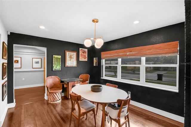 1322 N Bumby Ave, Orlando, FL 32803 - dining area with wood finished floors and recessed lighting