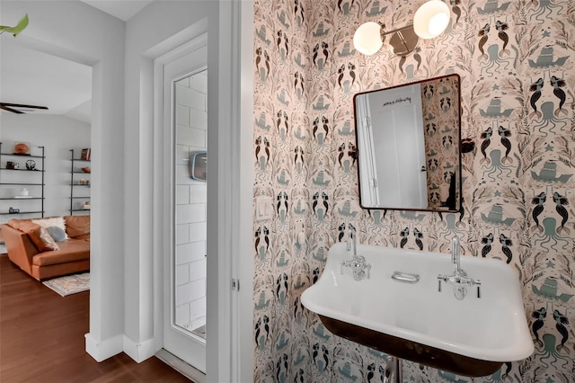 1322 N Bumby Ave, Orlando, FL 32803 - bathroom featuring wood finished floors and wallpapered walls