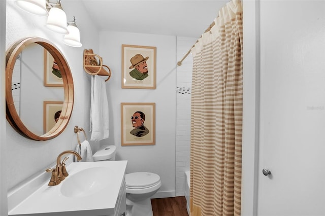 1322 N Bumby Ave, Orlando, FL 32803 - full bath with vanity, shower / tub combo, and wood finished floors