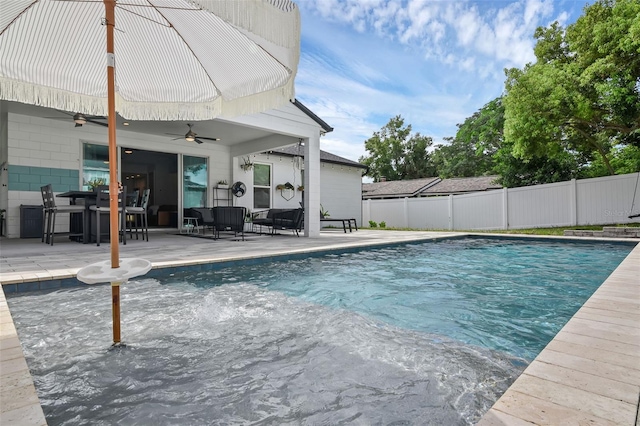 1322 N Bumby Ave, Orlando, FL 32803 - view of swimming pool featuring ceiling fan, a patio, and outdoor dining area