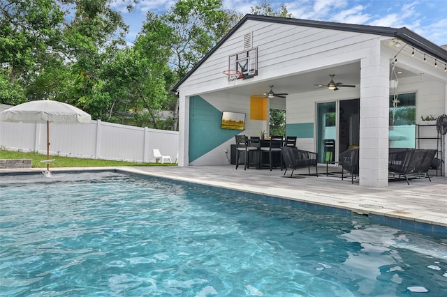 1322 N Bumby Ave, Orlando, FL 32803 - view of swimming pool with a ceiling fan and a patio