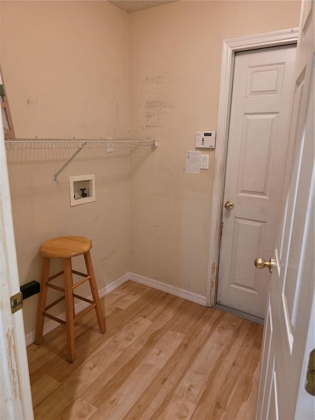 1797 Tillstream Dr, Orlando, FL 32818 - laundry area featuring light wood-type flooring and hookup for a washing machine