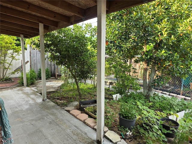 1797 Tillstream Dr, Orlando, FL 32818 - fenced backyard with a patio area