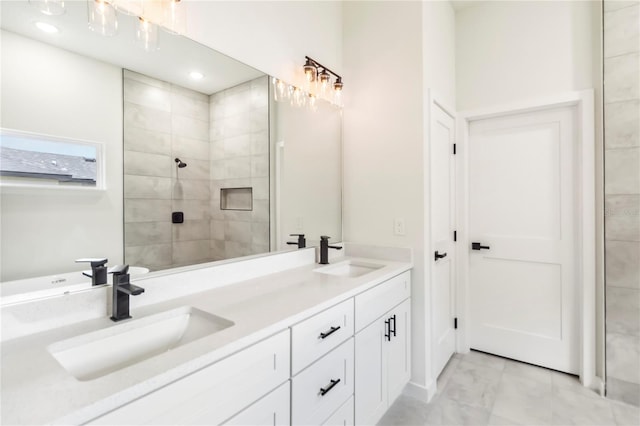 10599 N Umber Ter, Citrus Springs, FL 34434 - bathroom featuring double vanity, a tile shower, and marble look tiles