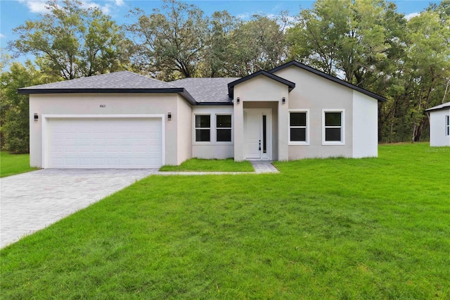 10611 N Umber Ter, Citrus Springs, FL 34434 - ranch-style house with decorative driveway, a garage, stucco siding, a front yard, and roof with shingles
