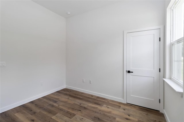 10611 N Umber Ter, Citrus Springs, FL 34434 - empty room featuring wood finished floors and baseboards