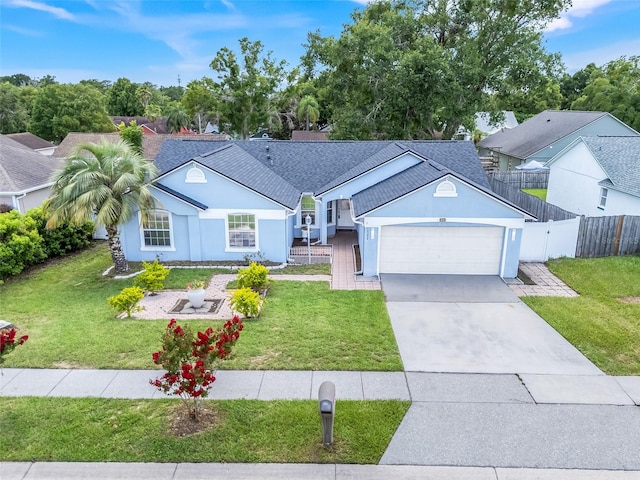 1322 Ravida Woods Dr, Apopka, FL 32703 - ranch-style house with stucco siding, an attached garage, concrete driveway, and a shingled roof