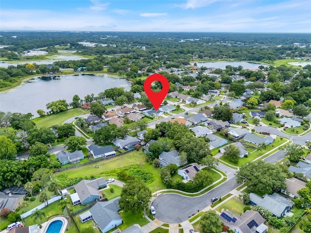 1322 Ravida Woods Dr, Apopka, FL 32703 - aerial view of property's location featuring a nearby body of water and nearby suburban area