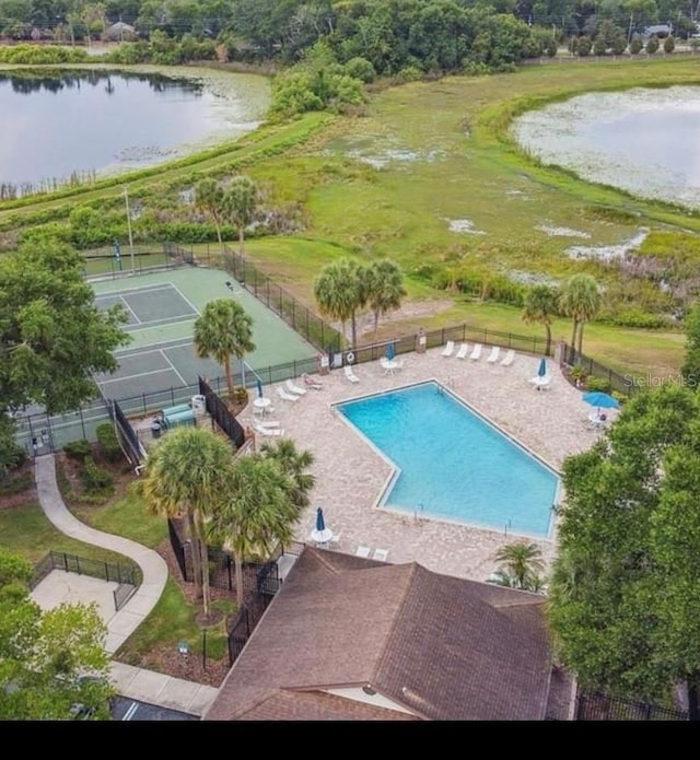 1322 Ravida Woods Dr, Apopka, FL 32703 - community pool featuring a water view