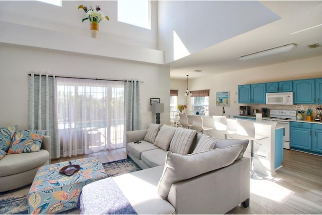 331 Bridgewater Dr, Davenport, FL 33897 - living area featuring light wood-style flooring