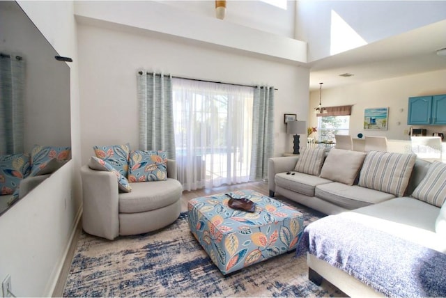 331 Bridgewater Dr, Davenport, FL 33897 - living area with a towering ceiling and wood finished floors