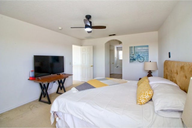 331 Bridgewater Dr, Davenport, FL 33897 - carpeted bedroom with arched walkways and a ceiling fan