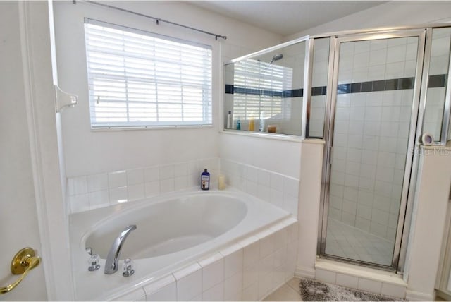 331 Bridgewater Dr, Davenport, FL 33897 - bathroom with a bath and a stall shower