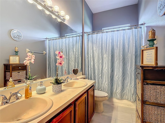 2530 The Oaks Blvd, Kissimmee, FL 34746 - full bath with double vanity, a shower with shower curtain, and tile patterned floors