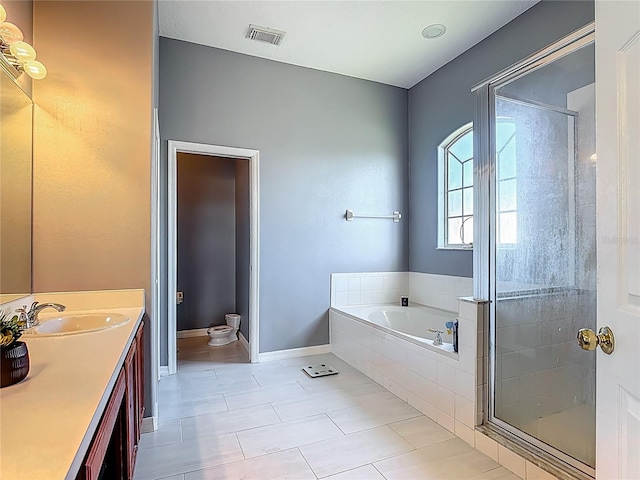 2530 The Oaks Blvd, Kissimmee, FL 34746 - full bath featuring tile patterned floors, a bath, a stall shower, and vanity