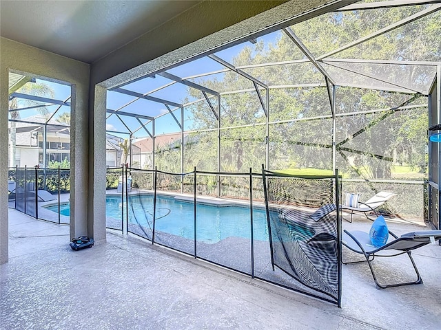 2530 The Oaks Blvd, Kissimmee, FL 34746 - view of pool featuring a patio area and a lanai