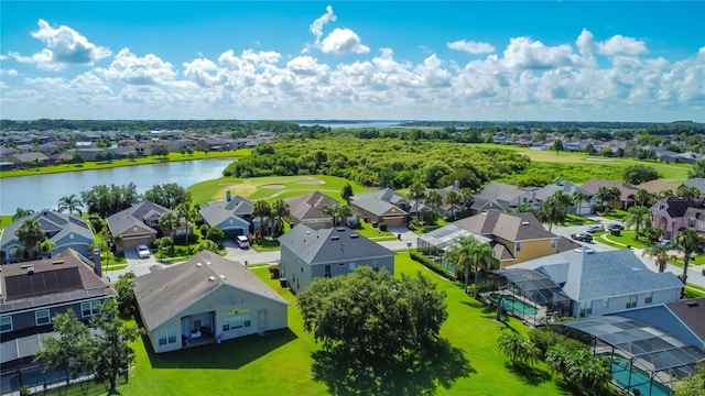 2530 The Oaks Blvd, Kissimmee, FL 34746 - aerial view of residential area featuring a nearby body of water and a local golf course