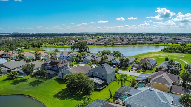 2530 The Oaks Blvd, Kissimmee, FL 34746 - aerial perspective of suburban area with a nearby body of water and a local golf course