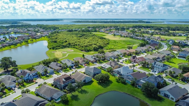 2530 The Oaks Blvd, Kissimmee, FL 34746 - aerial view of residential area featuring a large body of water and a golf course