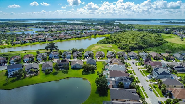 2530 The Oaks Blvd, Kissimmee, FL 34746 - aerial view of residential area featuring a nearby body of water and a golf course