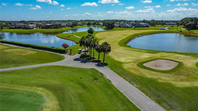 2530 The Oaks Blvd, Kissimmee, FL 34746 - surrounding community with a water view, a residential view, and view of golf course