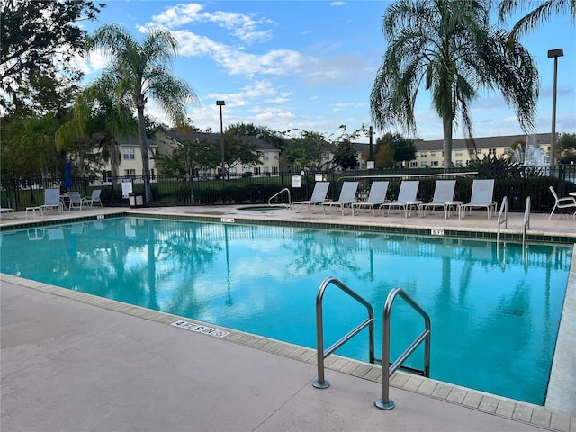 2770 Club Cortile Cir Unit A, Kissimmee, FL 34746 - community pool featuring a patio area