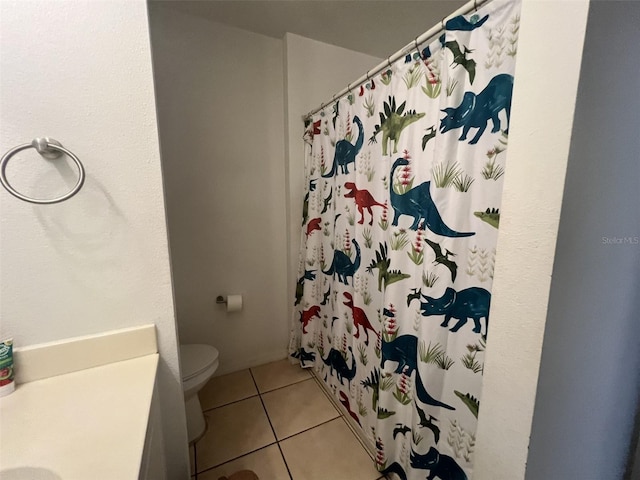 2770 Club Cortile Cir Unit A, Kissimmee, FL 34746 - bathroom with tile patterned flooring, vanity, and a shower with shower curtain