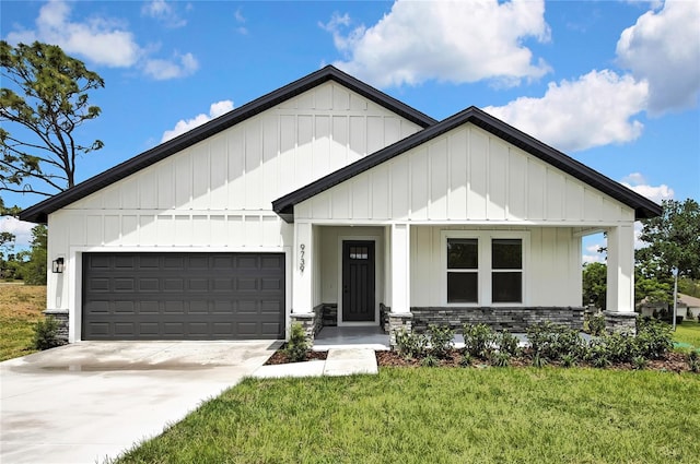 9739 Loretto St, Spring Hill, FL 34608 - modern farmhouse style home featuring a front yard, a garage, board and batten siding, concrete driveway, and stone siding
