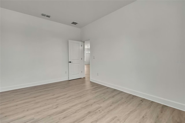 9739 Loretto St, Spring Hill, FL 34608 - unfurnished room with light wood-style floors and baseboards