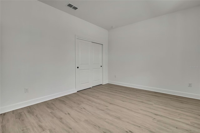 9739 Loretto St, Spring Hill, FL 34608 - empty room with light wood-style floors