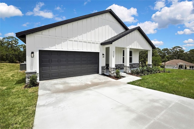 9739 Loretto St, Spring Hill, FL 34608 - modern farmhouse with board and batten siding, a front yard, a garage, and concrete driveway