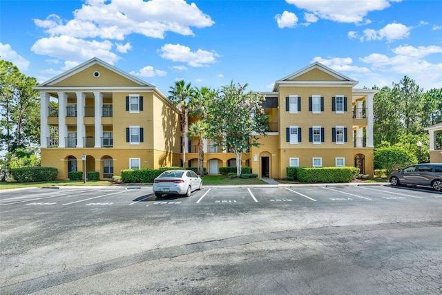 3757 Conroy Rd Unit 2525, Orlando, FL 32839 - view of building exterior featuring uncovered parking