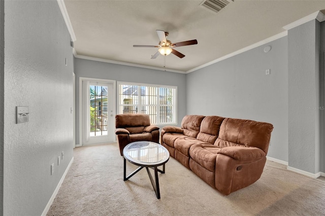 3757 Conroy Rd Unit 2525, Orlando, FL 32839 - living room with light colored carpet, a ceiling fan, ornamental molding, and a textured wall