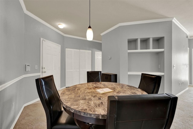 3757 Conroy Rd Unit 2525, Orlando, FL 32839 - carpeted dining area featuring ornamental molding and built in features