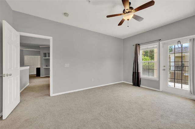3757 Conroy Rd Unit 2525, Orlando, FL 32839 - empty room featuring carpet, a ceiling fan, and a smoke detector