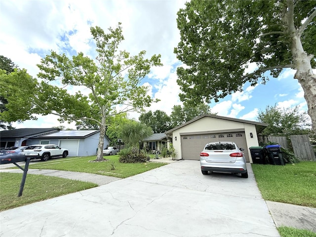 11310 Darlington Dr, Orlando, FL 32837 - ranch-style house with driveway and an attached garage