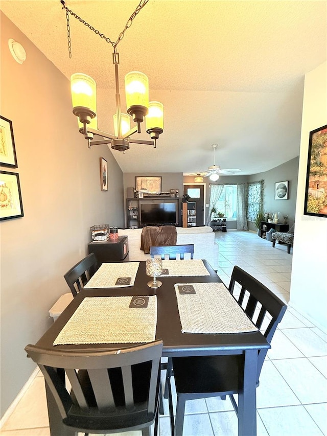 11310 Darlington Dr, Orlando, FL 32837 - dining space with a chandelier, light tile patterned flooring, and a ceiling fan