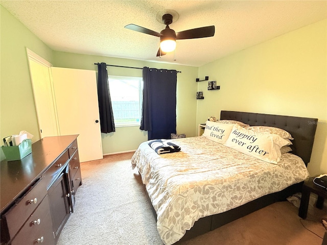 11310 Darlington Dr, Orlando, FL 32837 - bedroom with light colored carpet, a textured ceiling, and a ceiling fan