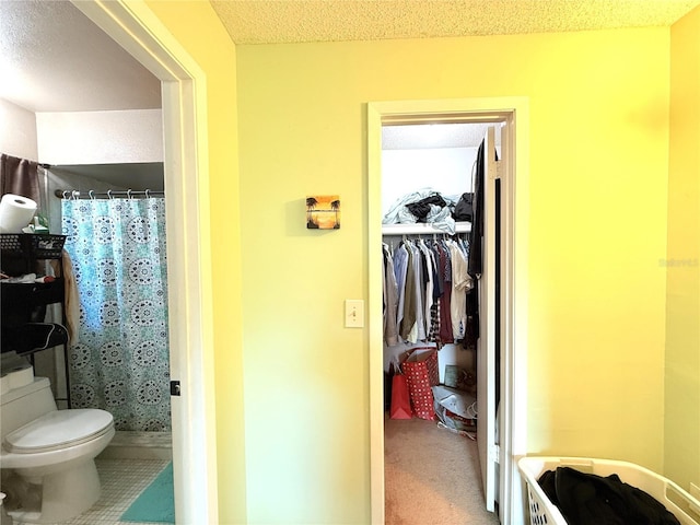 11310 Darlington Dr, Orlando, FL 32837 - bathroom featuring curtained shower and a textured ceiling