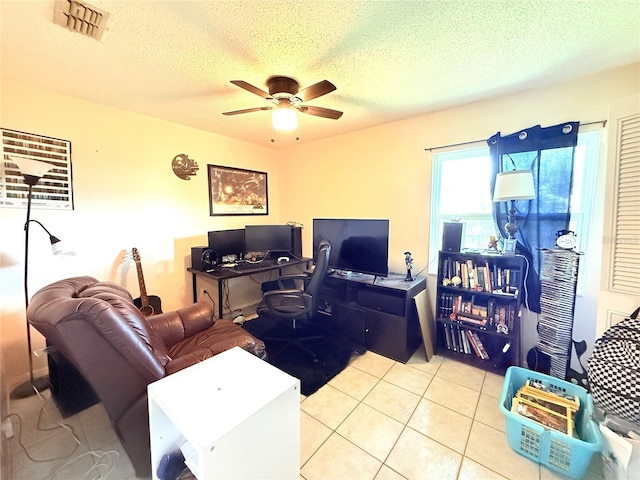 11310 Darlington Dr, Orlando, FL 32837 - office with a ceiling fan, a textured ceiling, and light tile patterned flooring