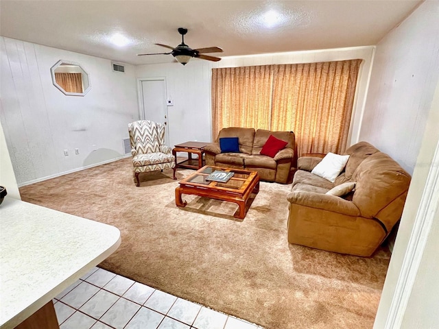 8547 Cedar Cove Dr, Orlando, FL 32819 - living area featuring light colored carpet, ceiling fan, and a textured ceiling