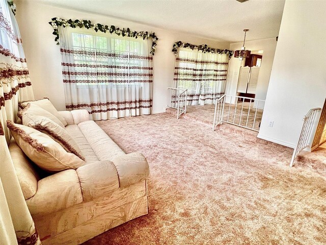 8547 Cedar Cove Dr, Orlando, FL 32819 - living room with carpet flooring and baseboards