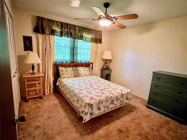 8547 Cedar Cove Dr, Orlando, FL 32819 - carpeted bedroom with a ceiling fan and a closet