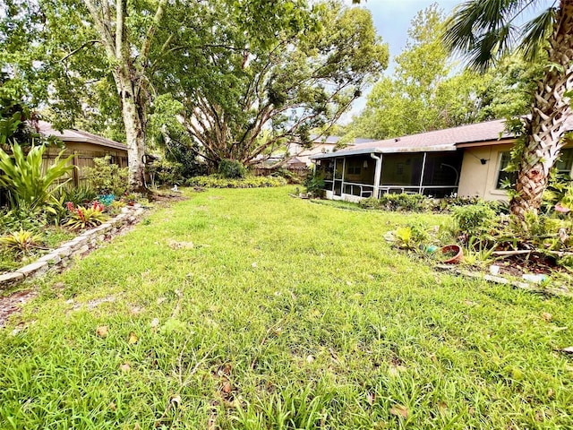 8547 Cedar Cove Dr, Orlando, FL 32819 - view of yard featuring a sunroom