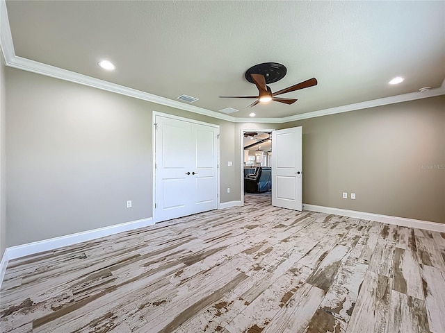 14243 County Road 450, Umatilla, FL 32784 - unfurnished bedroom featuring crown molding, light wood-style floors, recessed lighting, and ceiling fan