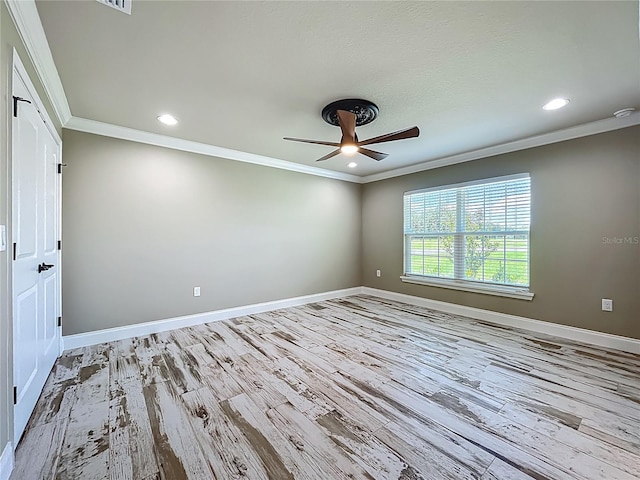 14243 County Road 450, Umatilla, FL 32784 - empty room with a ceiling fan, wood finished floors, crown molding, and recessed lighting
