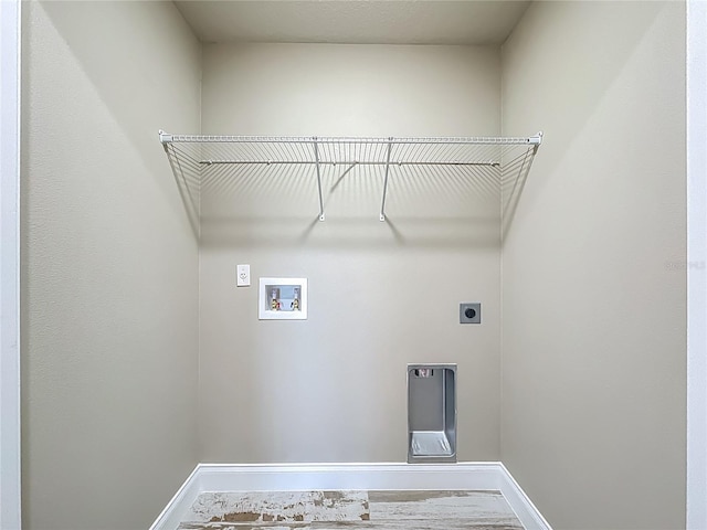 14243 County Road 450, Umatilla, FL 32784 - laundry room featuring hookup for an electric dryer and washer hookup